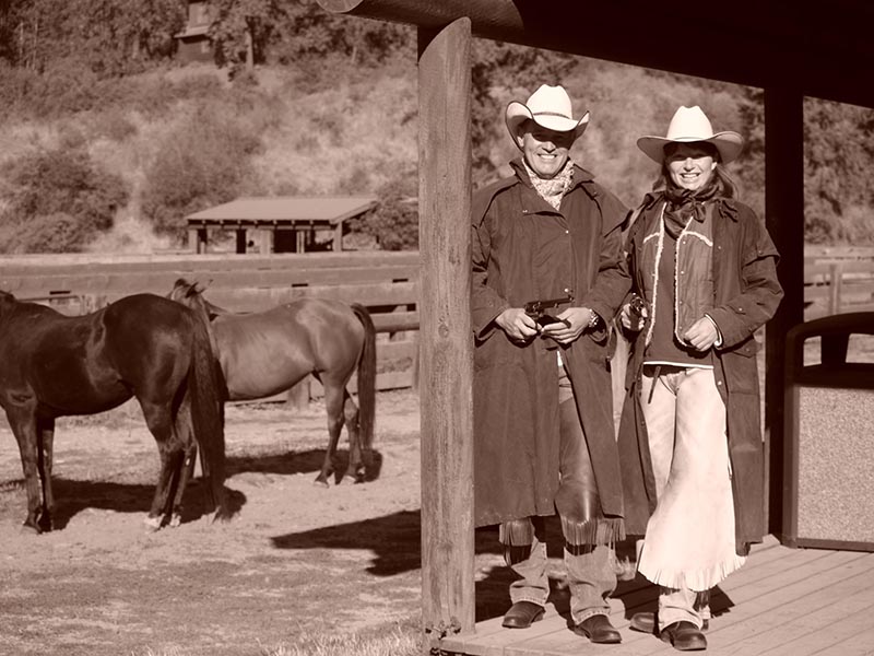 Couple posing in Cowboy regalia