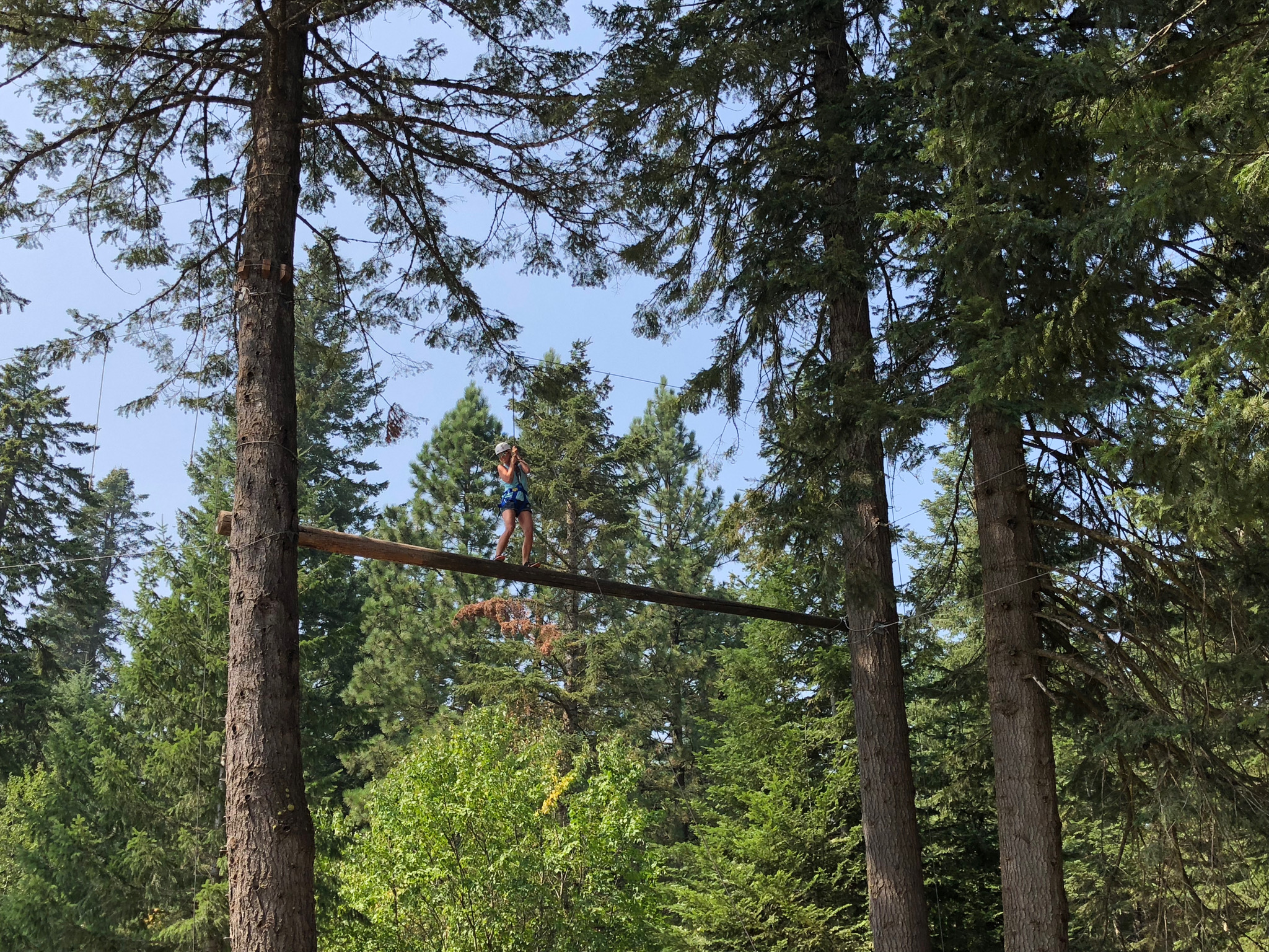Person on challenge course.