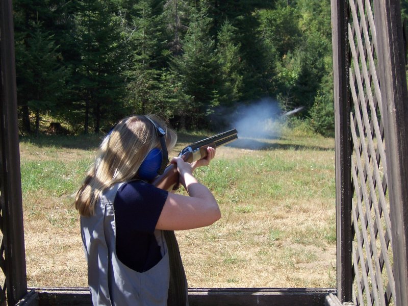 Woman clay target shooting