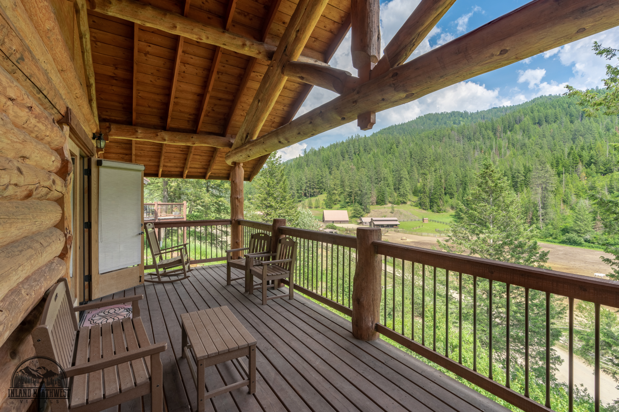 Monarch Cabin porch with view of ranch valley.