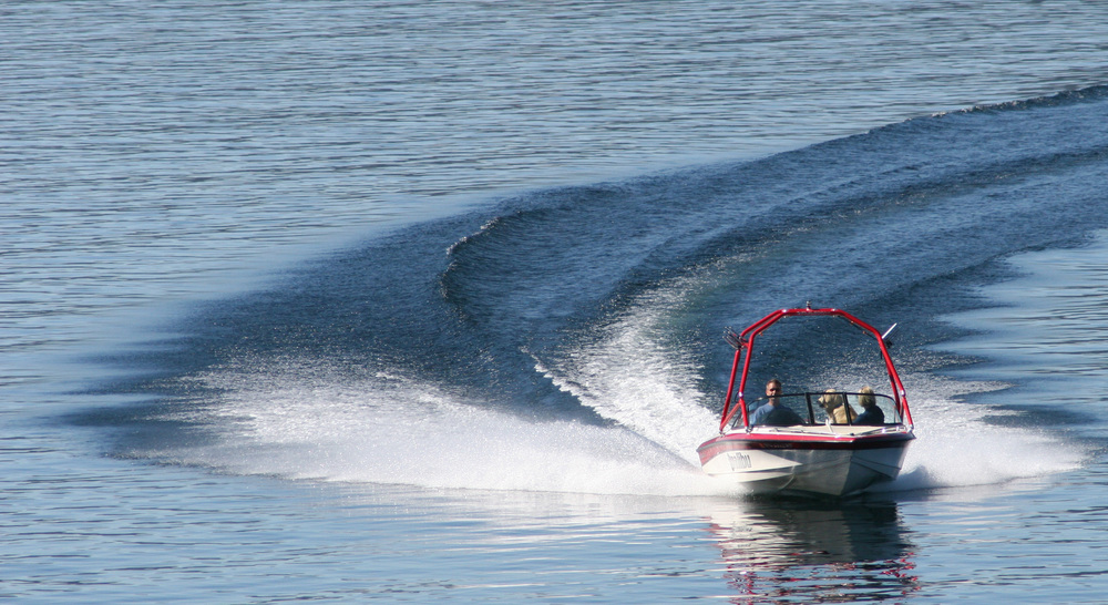 Photo of a Family Motoring on the Lake inside One of the Best Idaho Boat Rentals.