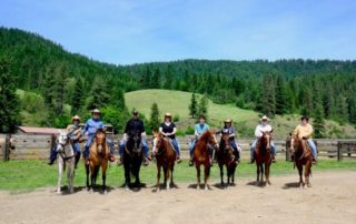 A crew of wranglers enjoy one of the best dude ranches for families in Idaho at RHMR.