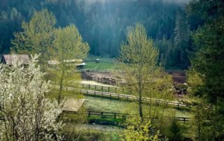 Places to Vacation in Idaho: The sun emerges over the foothills at Red Horse Mountain Ranch.